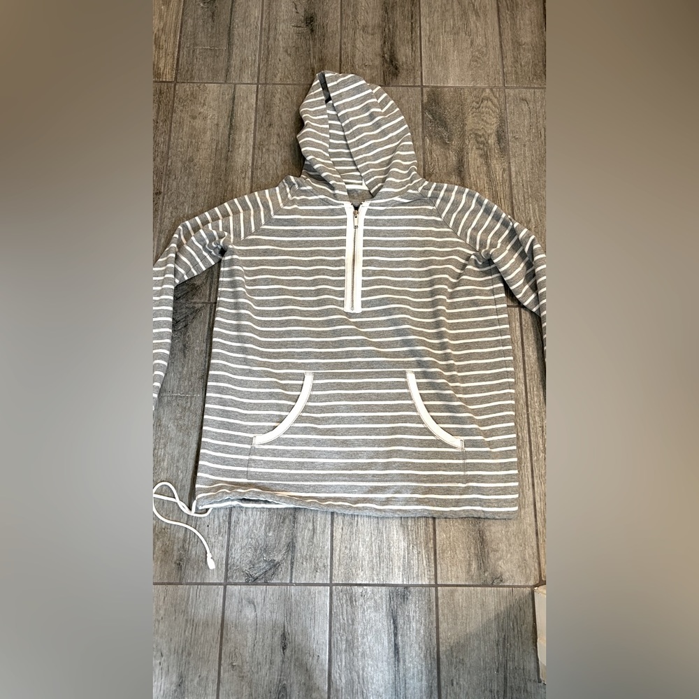 Cute zip striped hoodie with kangaroo pocket.